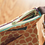 Small Burnt Orange and Tan Giraffe Print Crossbody Zipper Bag - Image 5